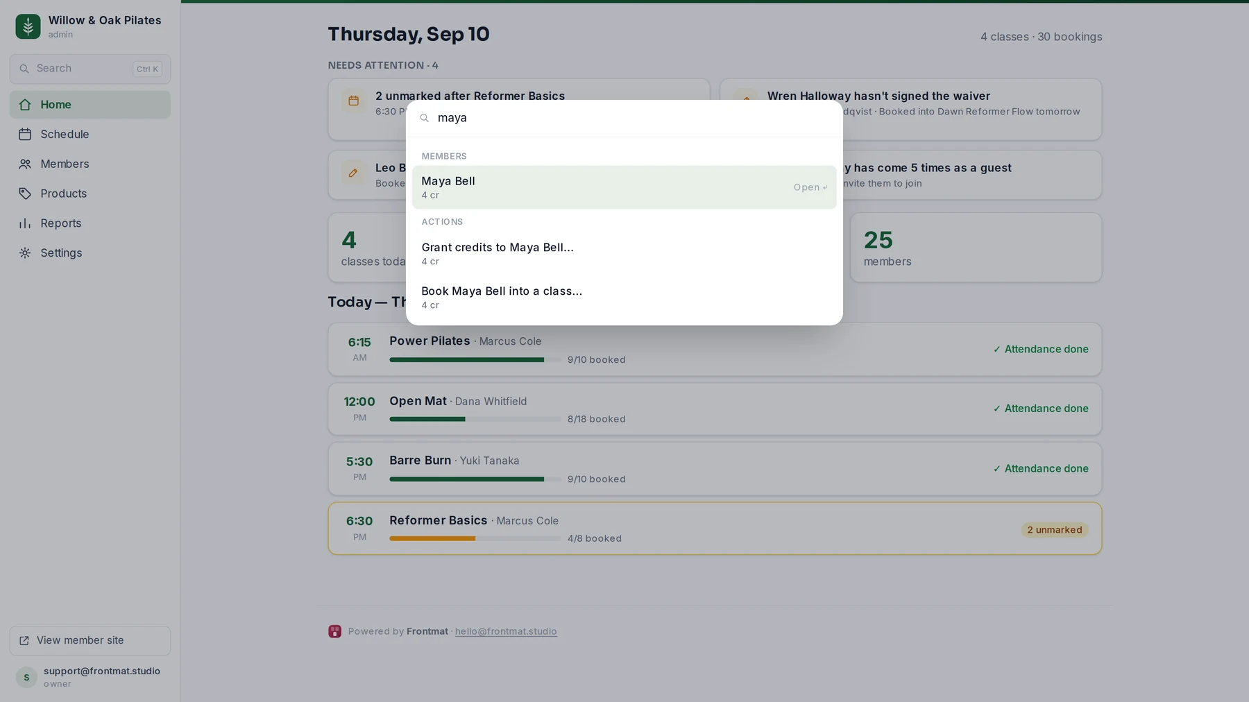 The command palette open over Home: typing a member's first name offers their record plus actions like granting credits or booking them into a class.